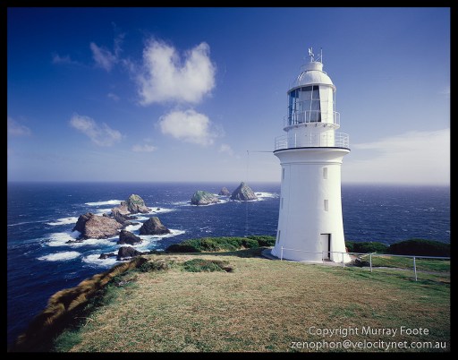 Maatsuyker lighthouse and rocks from cliff edge 2:00pm 22 April 1987 Nagaoka Field Camera 5x4" 65mm Schneider Super Angulon f16 1/30 second + polariser Fujichrome 50